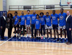 The young men participating alongside Byron Brown, Senator Kennedy, and Board of Education President Sharon Belton-Cottman