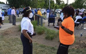 MVP team member speaking with a police officer at an event