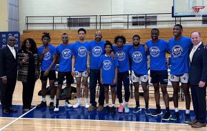 The young men participating alongside Byron Brown, Senator Kennedy, and Board of Education President Sharon Belton-Cottman