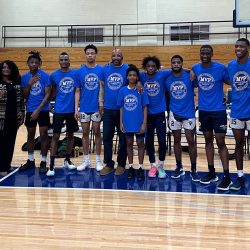 The young men participating alongside Byron Brown, Senator Kennedy, and Board of Education President Sharon Belton-Cottman